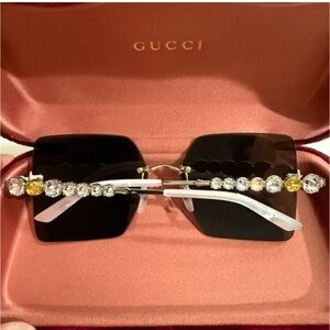 Gucci Black Sunglasses with Gold and Silver Accents